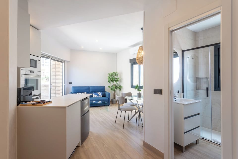 Premium Apartment, 1 Bedroom, Terrace | Living area | 50-inch Smart TV with digital channels, TV