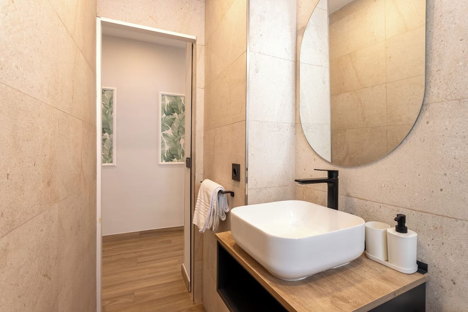 Family Apartment, 2 Bedrooms, Beachside | Bathroom | Hydromassage showerhead, free toiletries, hair dryer, towels