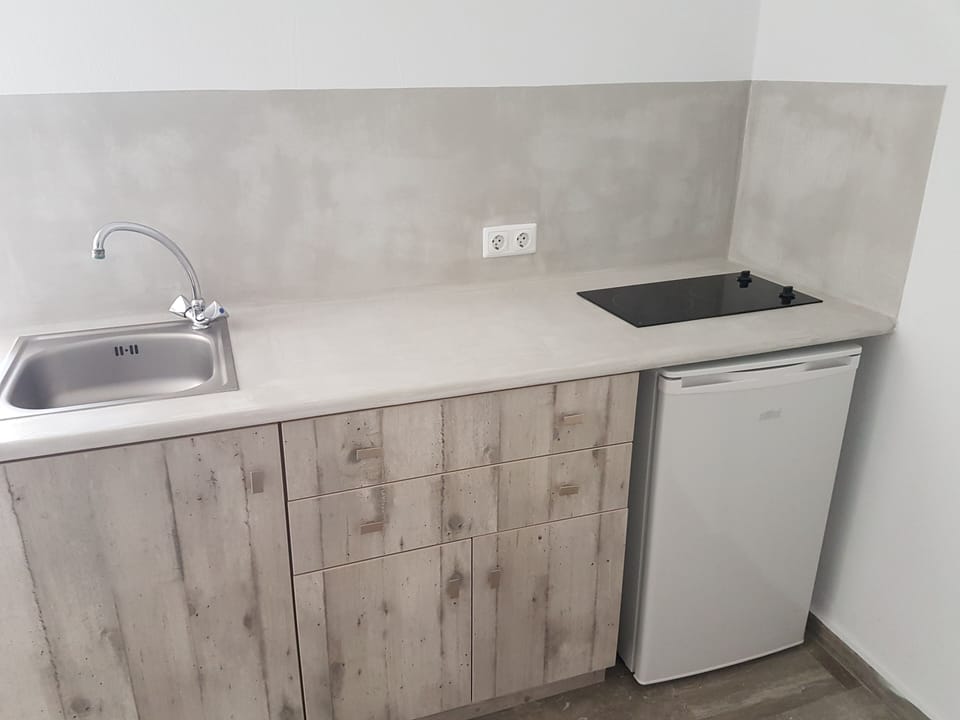 Deluxe Studio | Private kitchenette | Fridge, stovetop, electric kettle, cookware/dishes/utensils