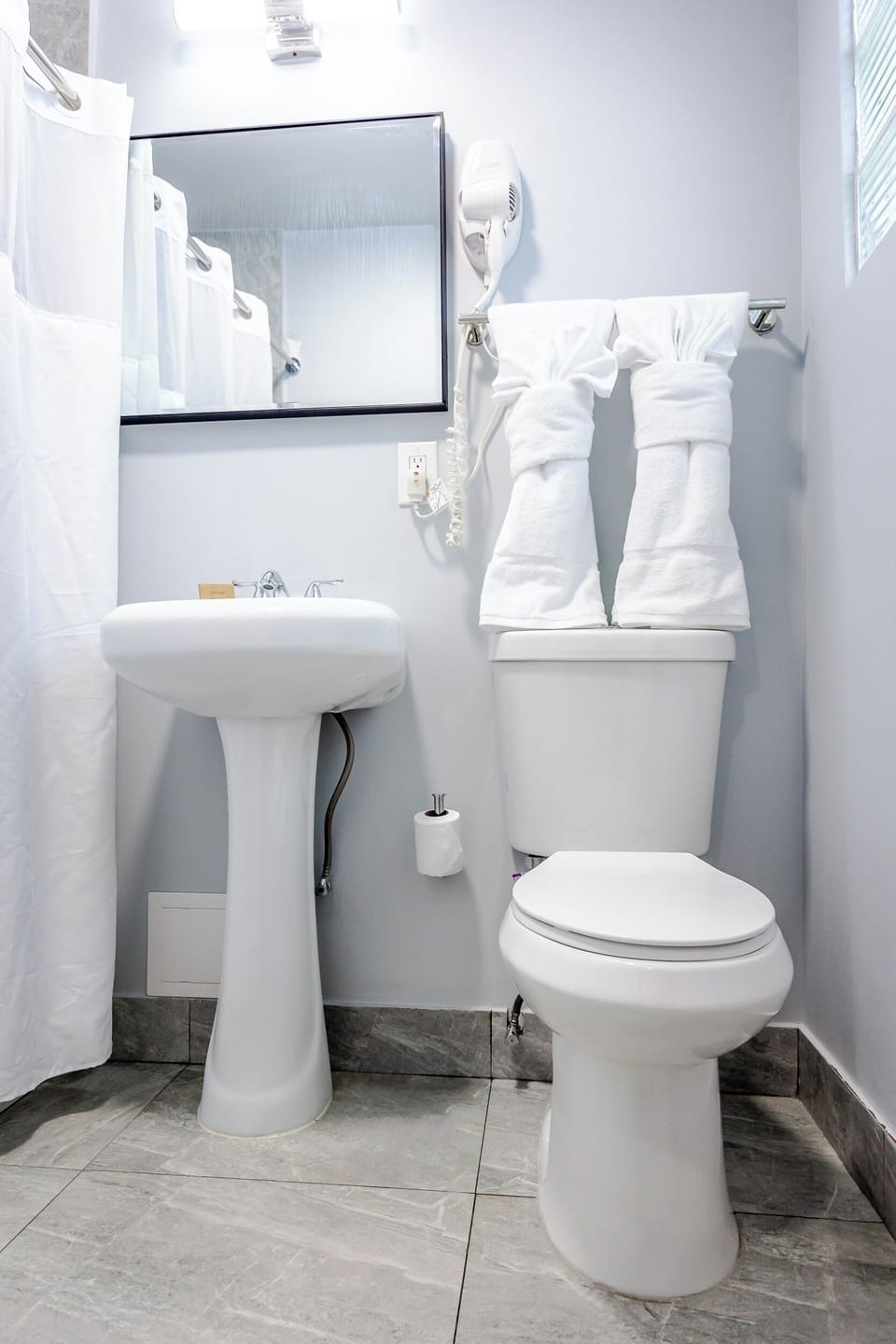 Hair dryer, towels, soap, shampoo