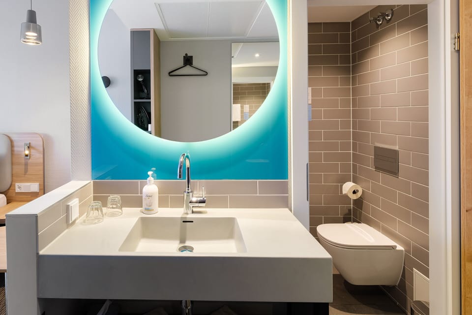 Shower, eco-friendly toiletries, hair dryer, towels
