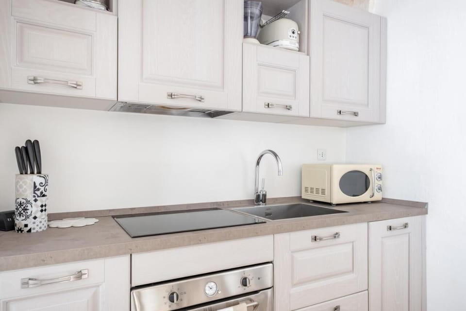 Apartment | Private kitchen | Full-size fridge, microwave, oven, stovetop