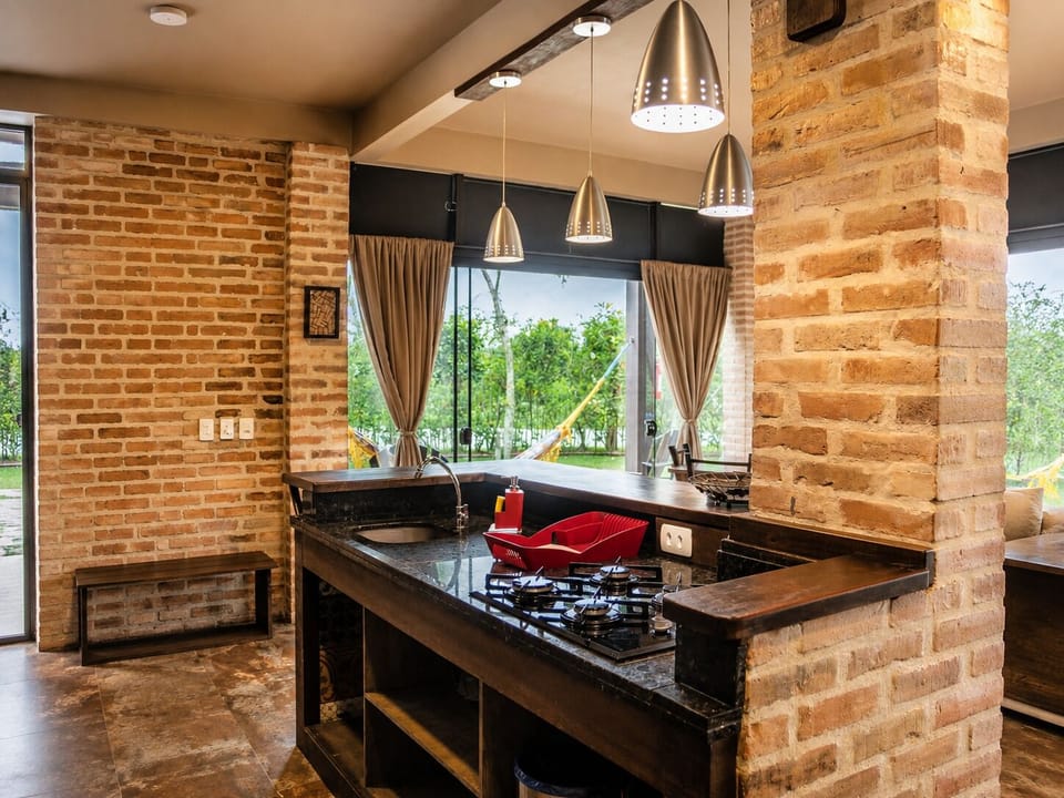 Studio Jardim - Ibiraquera Life | Private kitchen | Microwave, stovetop, toaster, cookware/dishes/utensils
