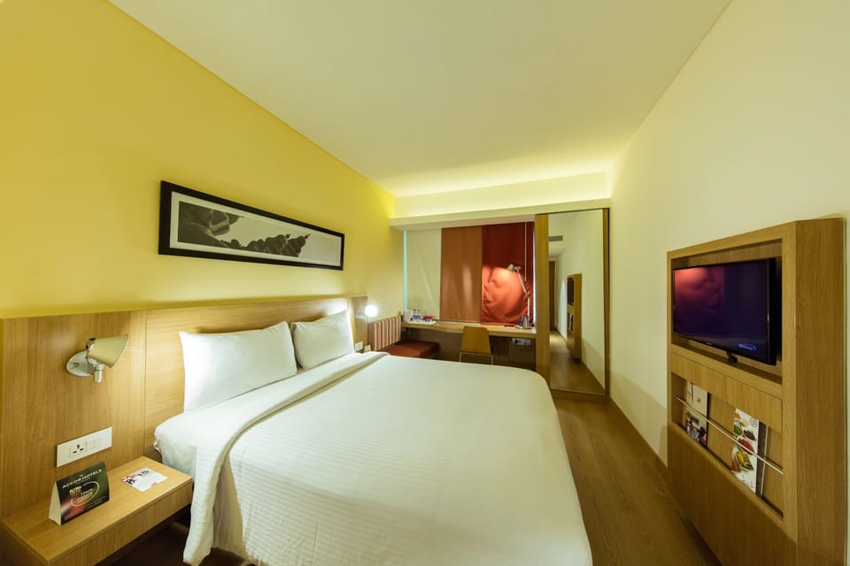 Premium bedding, down comforters, memory foam beds, minibar