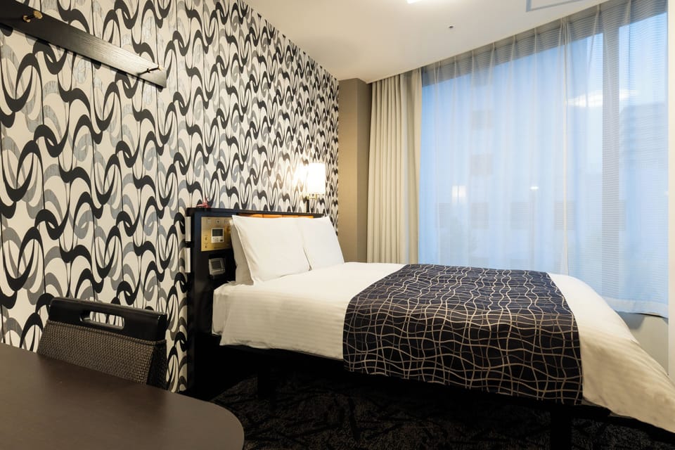 Desk, blackout drapes, free WiFi, bed sheets
