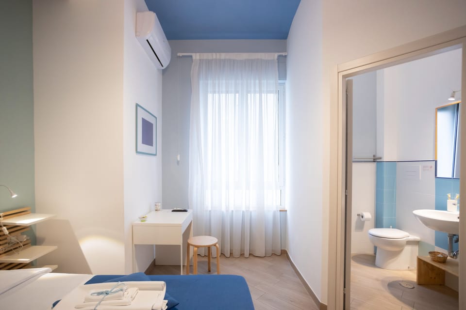 City Room | Down comforters, individually decorated, individually furnished, desk