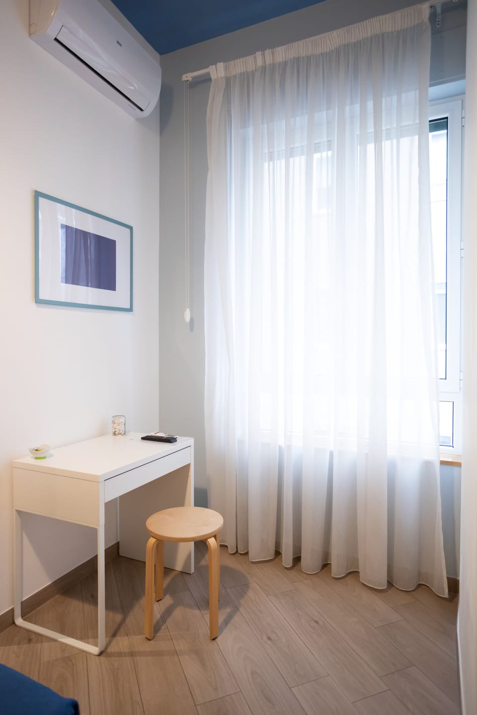 City Room | Down comforters, desk, laptop workspace, soundproofing