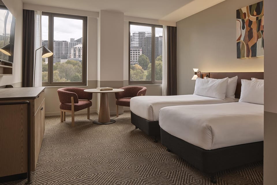 Twin Room (Newly Renovated) | Minibar, in-room safe, desk, laptop workspace