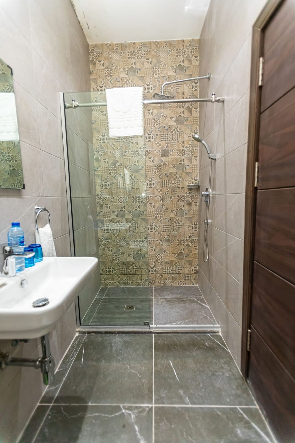 Shower, rainfall showerhead, hair dryer (on request), bathrobes
