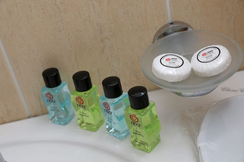 Shower, free toiletries, hair dryer, slippers