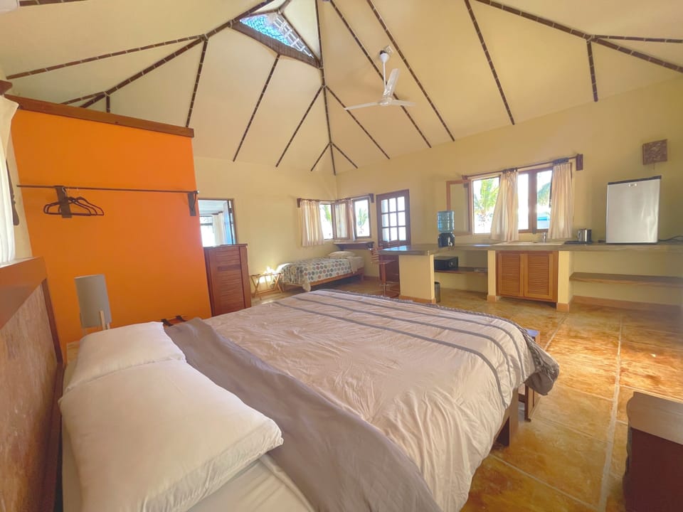 Deluxe Room, 2 Bedrooms, Patio, Ocean View | In-room safe, blackout drapes, WiFi (free), bed sheets