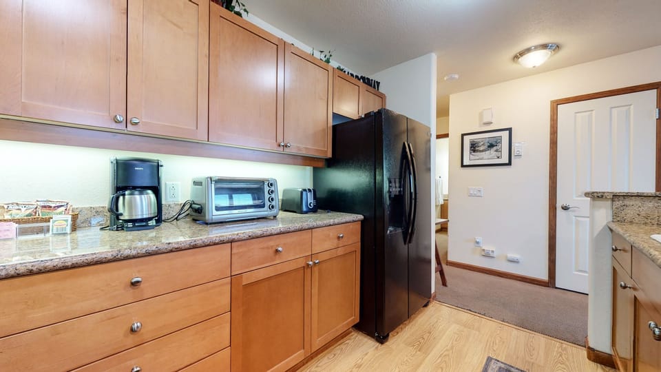 Condo, 2 Bedrooms | Private kitchen | Fridge, oven, coffee/tea maker, toaster