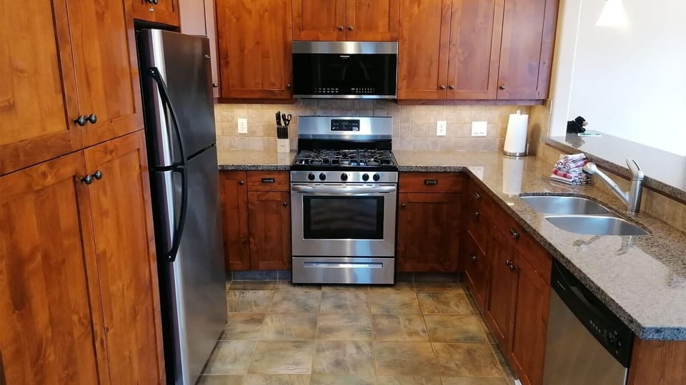 Townhome, 4 Bedrooms | Private kitchen | Coffee/tea maker, fridge, oven, toaster