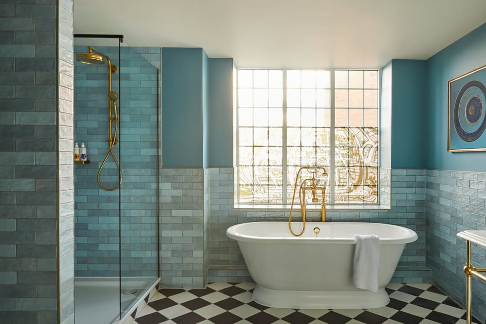 Designer toiletries, hair dryer, bathrobes, towels