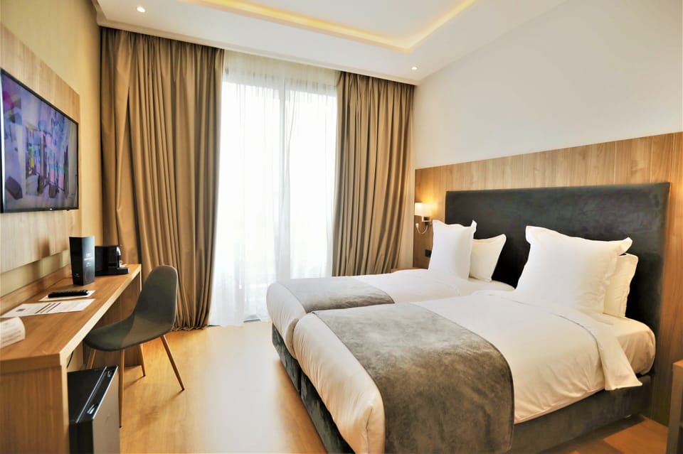 Premium bedding, in-room safe, desk, soundproofing