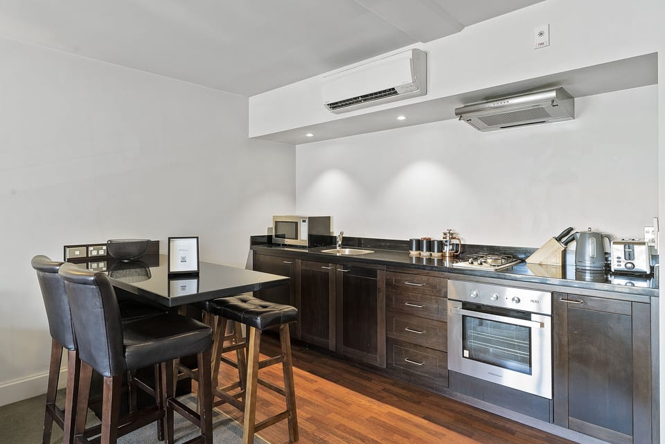 Apartment | Private kitchen | Full-size fridge, microwave, oven, stovetop