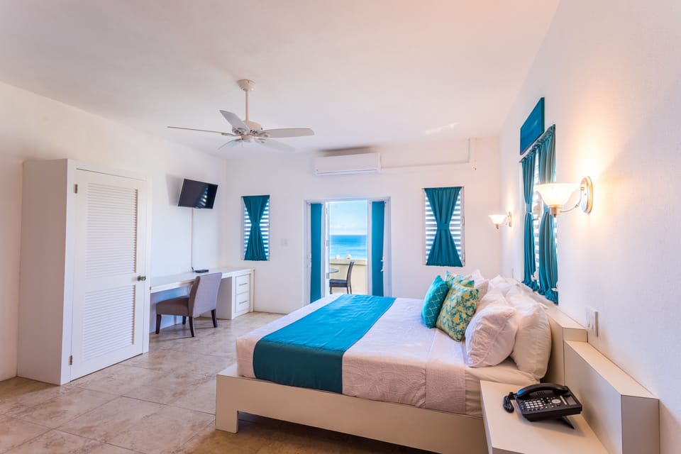 Suite, 1 Bedroom, Kitchen, Ocean View | In-room safe, desk, soundproofing, iron/ironing board