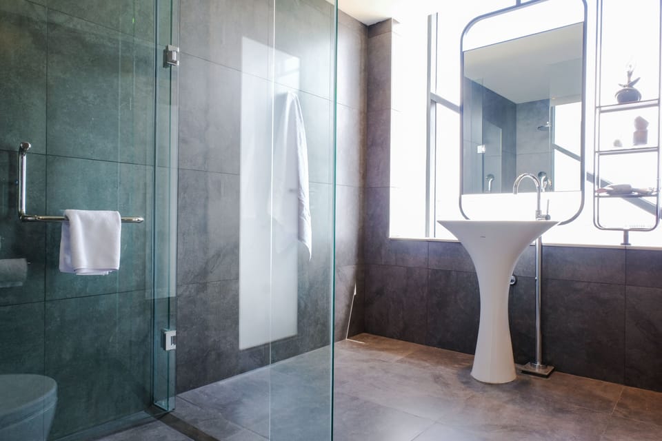 Studio 45 | Bathroom | Shower, rainfall showerhead, free toiletries, hair dryer