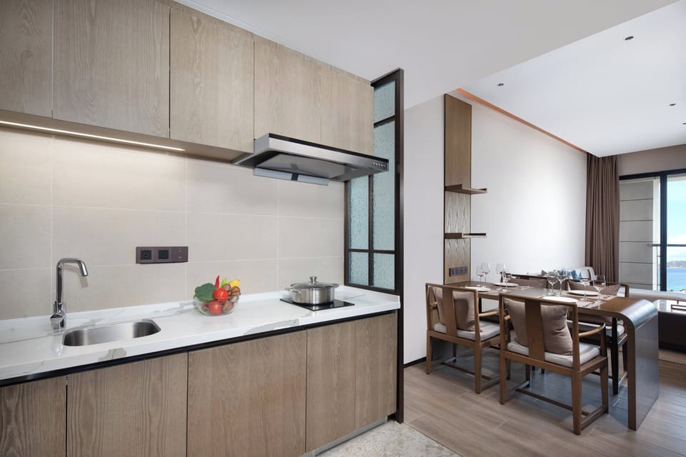 Suite, 2 Bedrooms (Dining Area) | In-room safe, desk, blackout drapes, soundproofing
