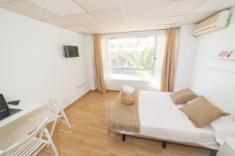 Panoramic Room | Memory foam beds, desk, laptop workspace, free WiFi