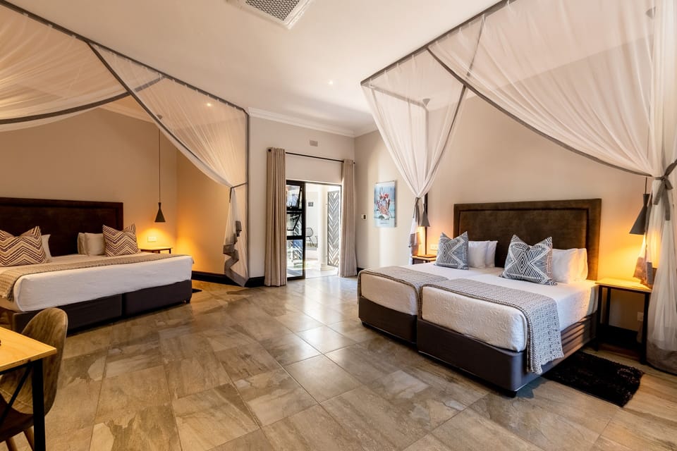 Superior Quadruple Room | Pillowtop beds, in-room safe, desk, laptop workspace