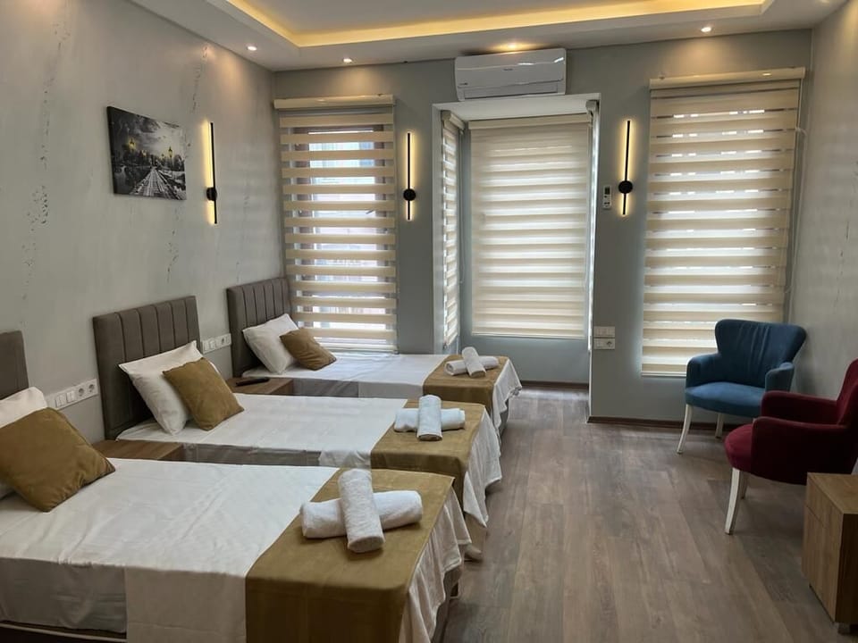 Business Quadruple Room, Multiple Beds | Desk, blackout drapes, soundproofing, iron/ironing board