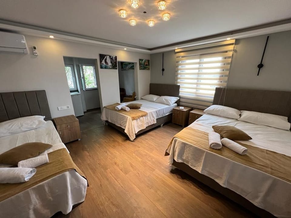 Business Quadruple Room, Multiple Beds | Desk, blackout drapes, soundproofing, iron/ironing board