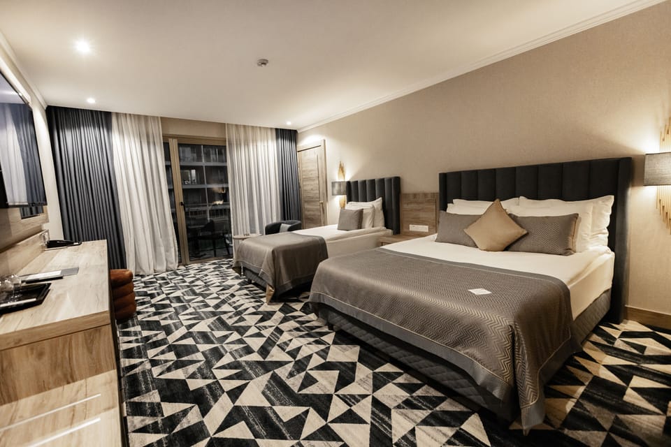 Premium bedding, minibar (free items), in-room safe, laptop workspace