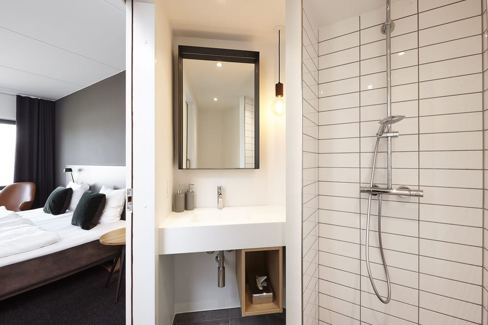 Eco-friendly toiletries, hair dryer, towels, soap