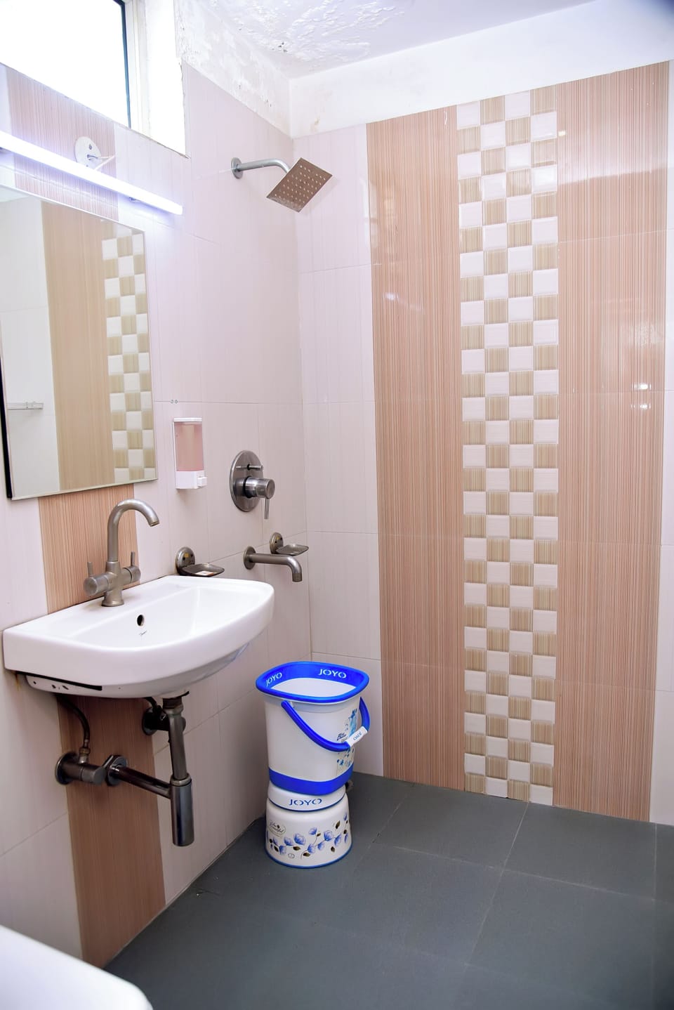 Shower, rainfall showerhead, slippers, towels