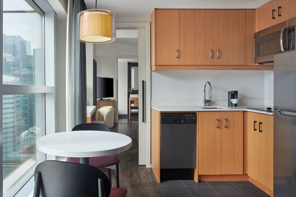 Executive Suite, 1 Bedroom | In-room safe, desk, iron/ironing board, free cribs/infant beds