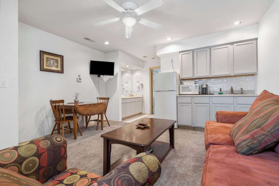 Condo, 1 King Bed with Sofa bed, Patio (Swansons King Suite) | Living area | 42-inch flat-screen TV with digital channels