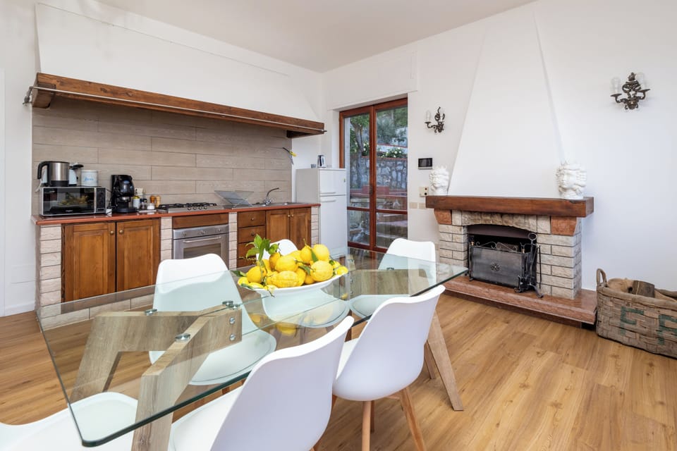 Panoramic Villa | Private kitchen | Full-size fridge, stovetop, espresso maker, coffee/tea maker