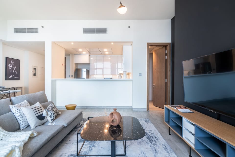 Premium Apartment, 2 Bedrooms, Non Smoking, Pool View | Living room | 55-inch Smart TV with cable channels, TV, streaming services