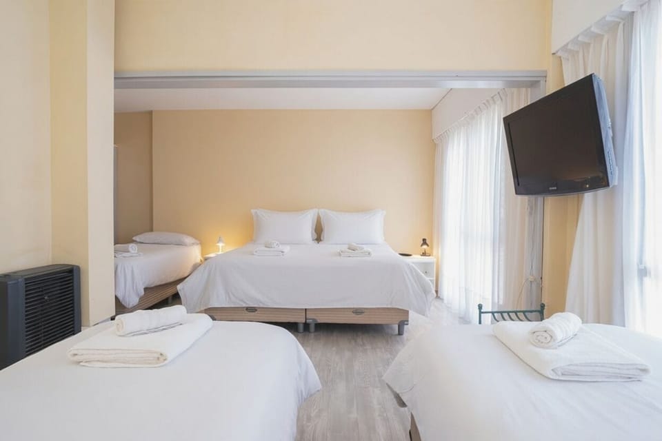 Family Room | Hypo-allergenic bedding, down comforters, in-room safe, free WiFi