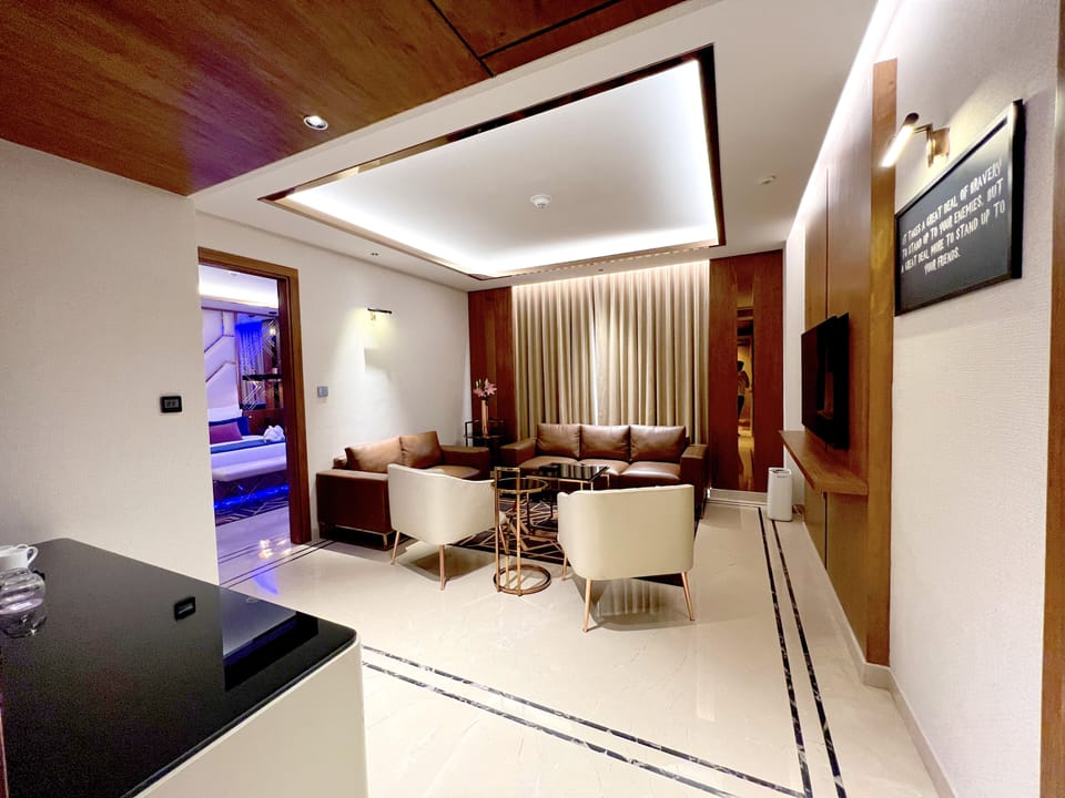 Executive Studio Suite, 1 Double Bed | Living area | 55-inch Smart TV with digital channels, TV