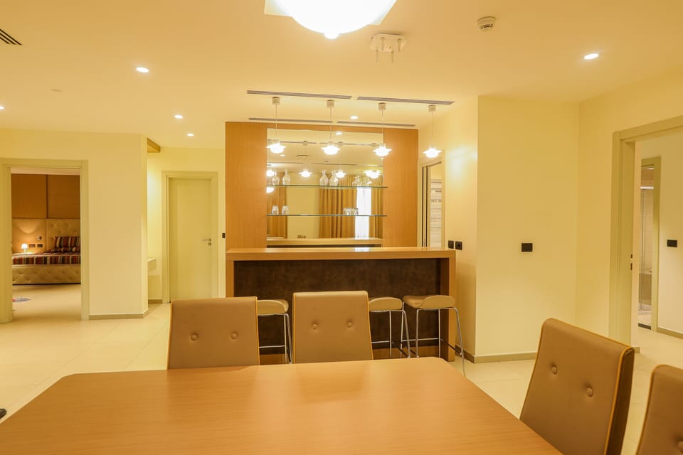 Presidential Suite | Living area | Flat-screen TV, foosball, table tennis