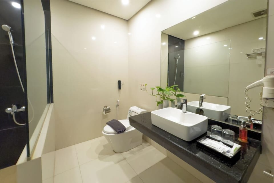 Shower, free toiletries, hair dryer, slippers