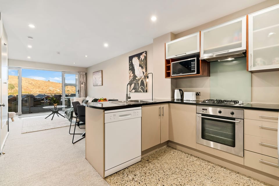Apartment | Private kitchen | Full-size fridge, microwave, oven, stovetop