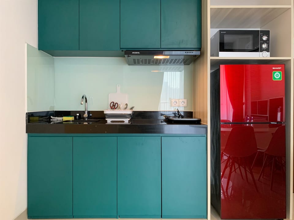 Apartment, 2 Bedrooms | Private kitchen | Fridge, electric kettle, cookware/dishes/utensils, dining tables