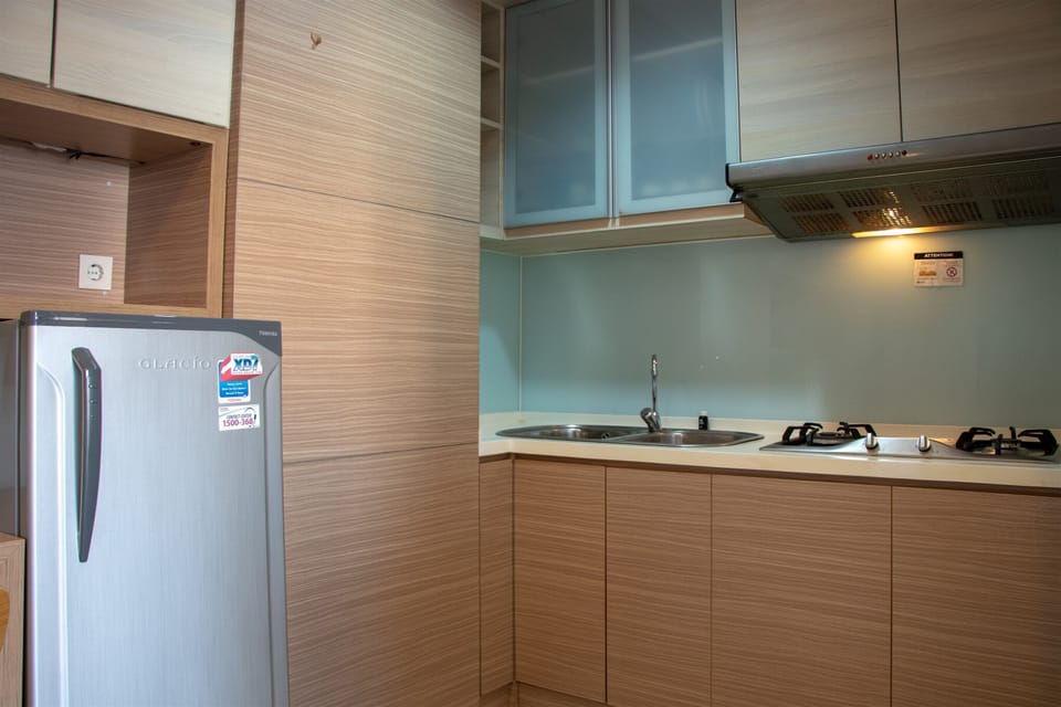 Apartment, 2 Bedrooms | Private kitchen | Fridge, stovetop, cookware/dishes/utensils, dining tables