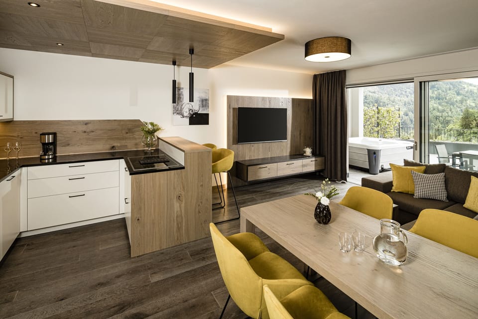 Superior Apartment | Living area | 48-inch flat-screen TV with satellite channels, TV