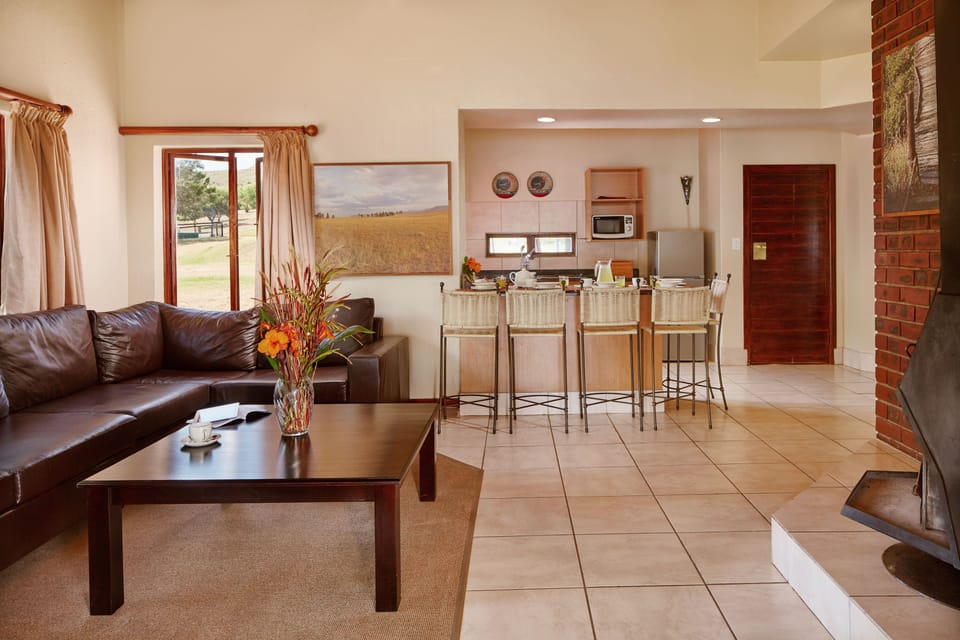 Chalet, 3 Bedrooms | Living room | TV, fireplace