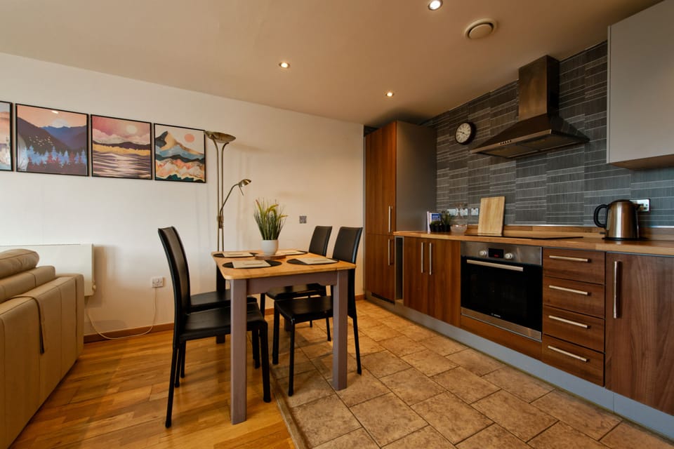 Comfort Apartment | Living area | 75-inch Smart TV with cable channels, TV