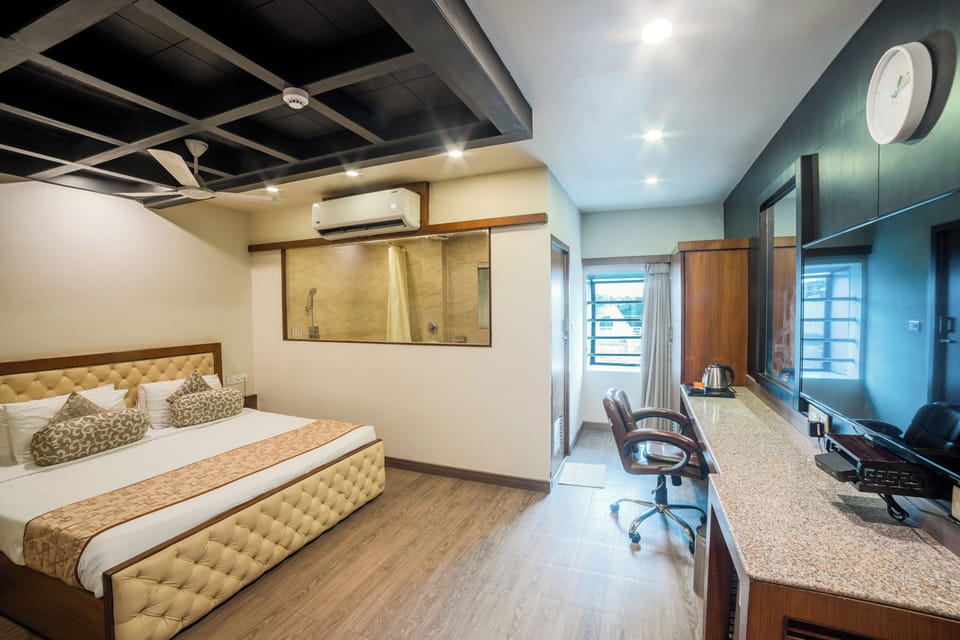 Deluxe Room | Premium bedding, in-room safe, desk, soundproofing