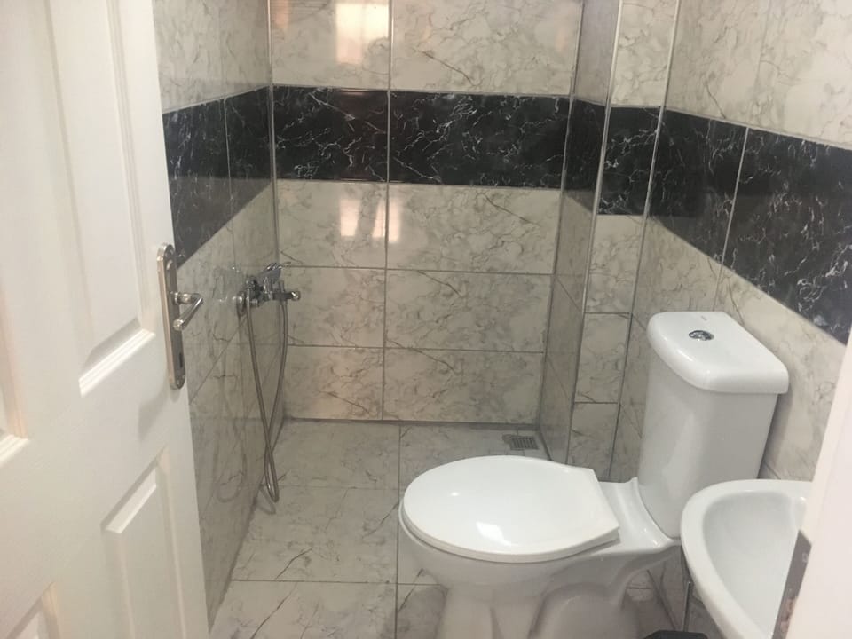 Shower, rainfall showerhead, towels