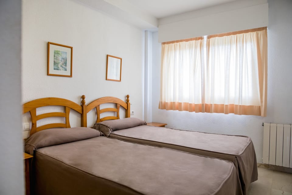 Apartment, 2 Bedrooms, Balcony | 2 bedrooms, pillowtop beds, in-room safe, iron/ironing board