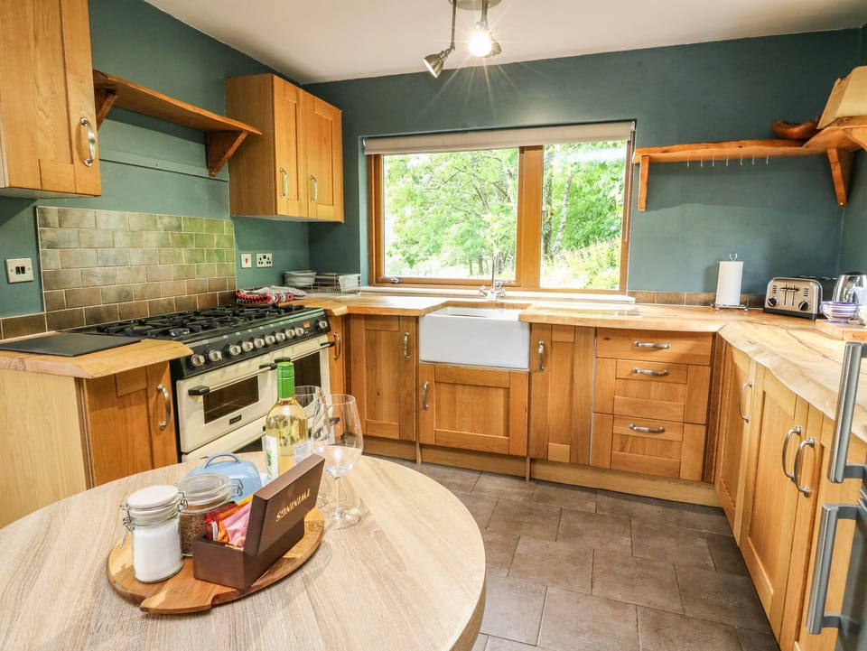 Fridge, electric kettle, cookware/dishes/utensils