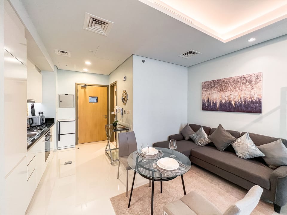 Standard Studio | Living area | 50-inch LCD TV with satellite channels, TV