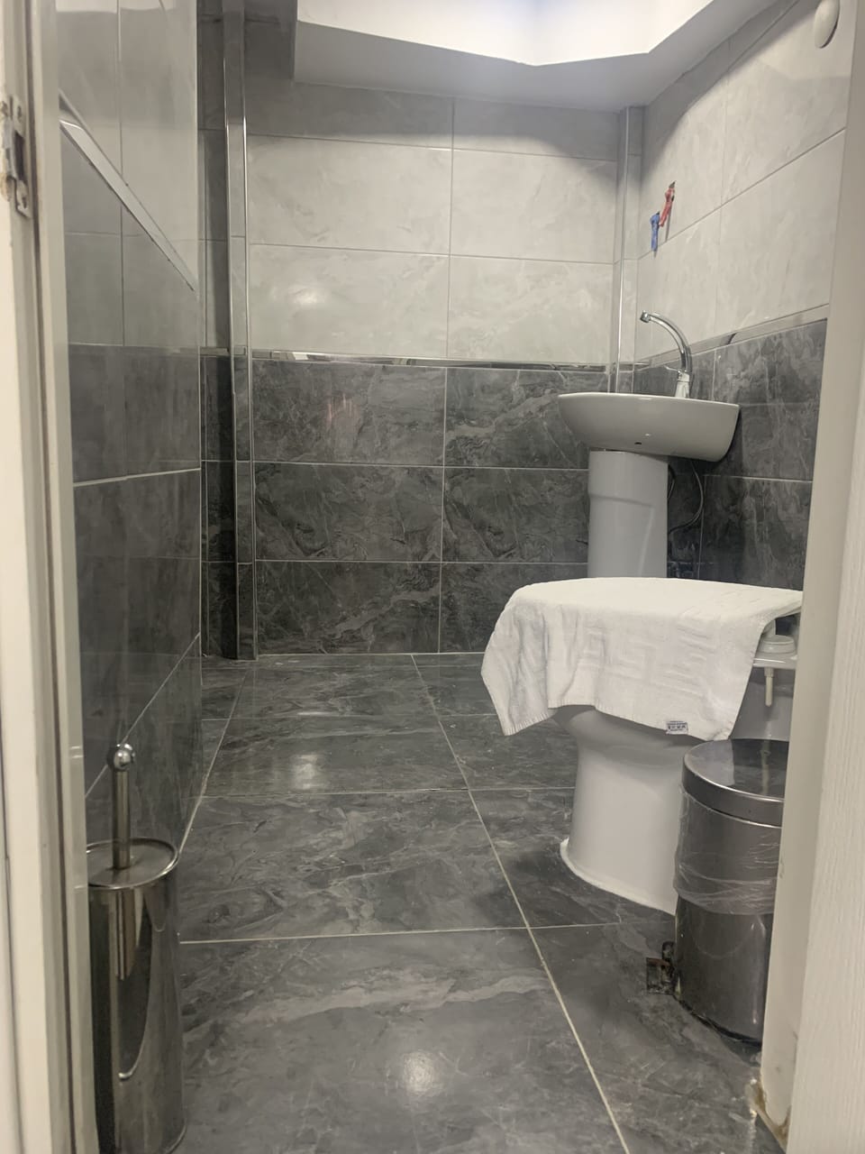 Economy Quadruple Room | Bathroom | Shower, rainfall showerhead, hair dryer, towels